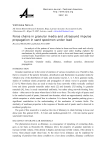 Force chains in granular media and ultrasound impulse propagation in sand specimen under load